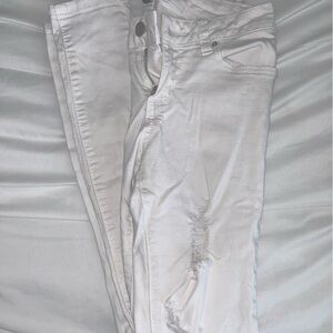 White ripped jeans